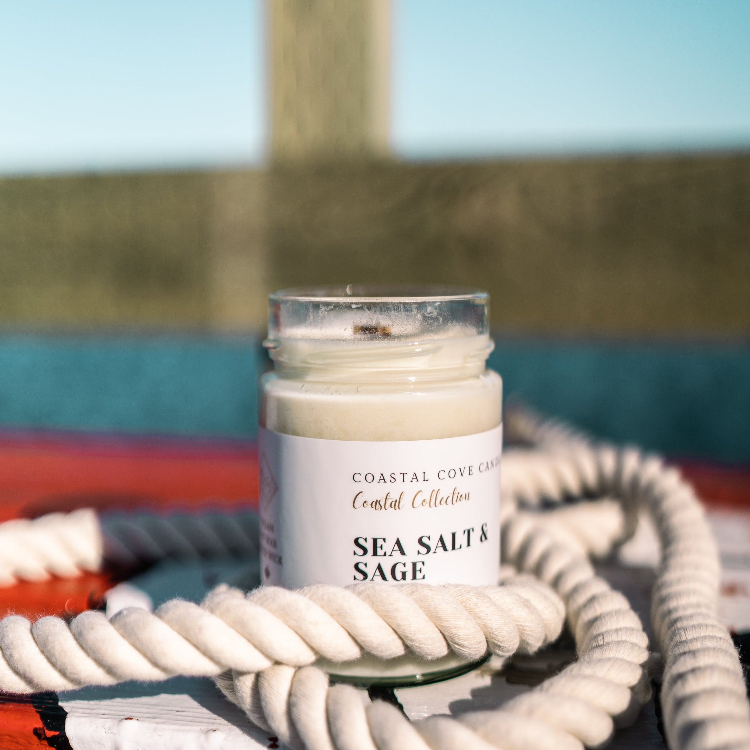 Image of a handcrafted soy wax candle with a wooden wick