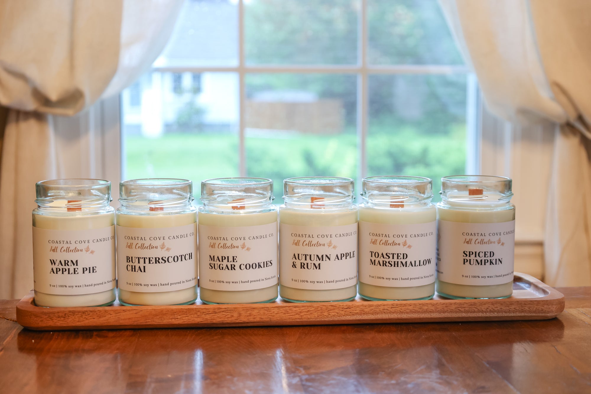 fall collection of soy wax candles with a wood wick