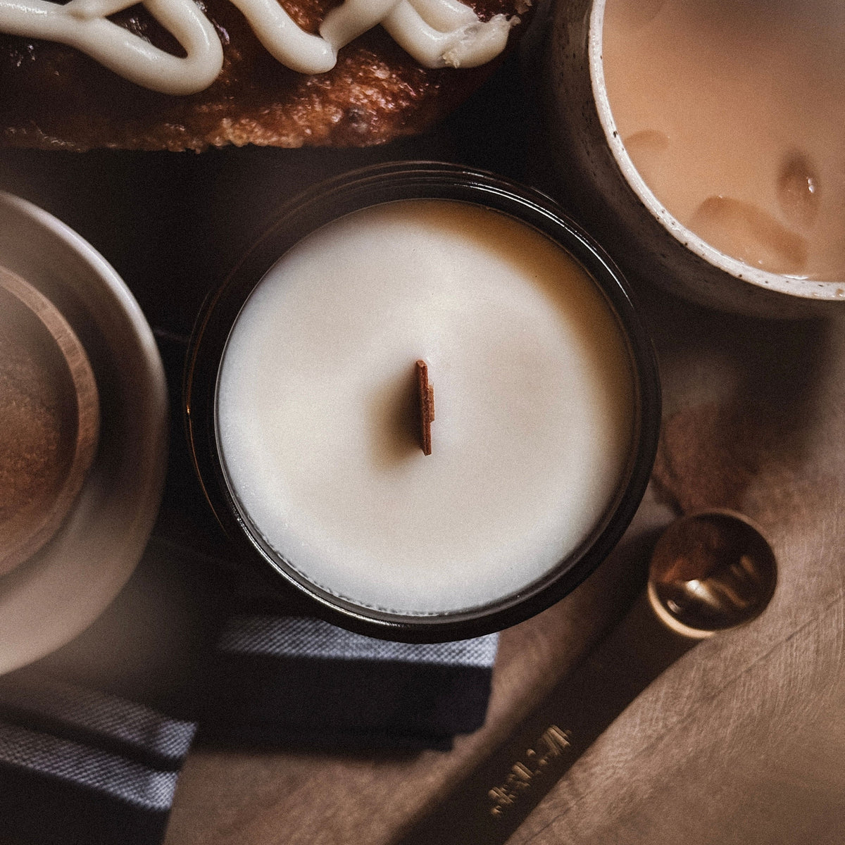 Coastal Coev Candle Co. Warm Cinnamon Bun candle soy wax wood wick. 