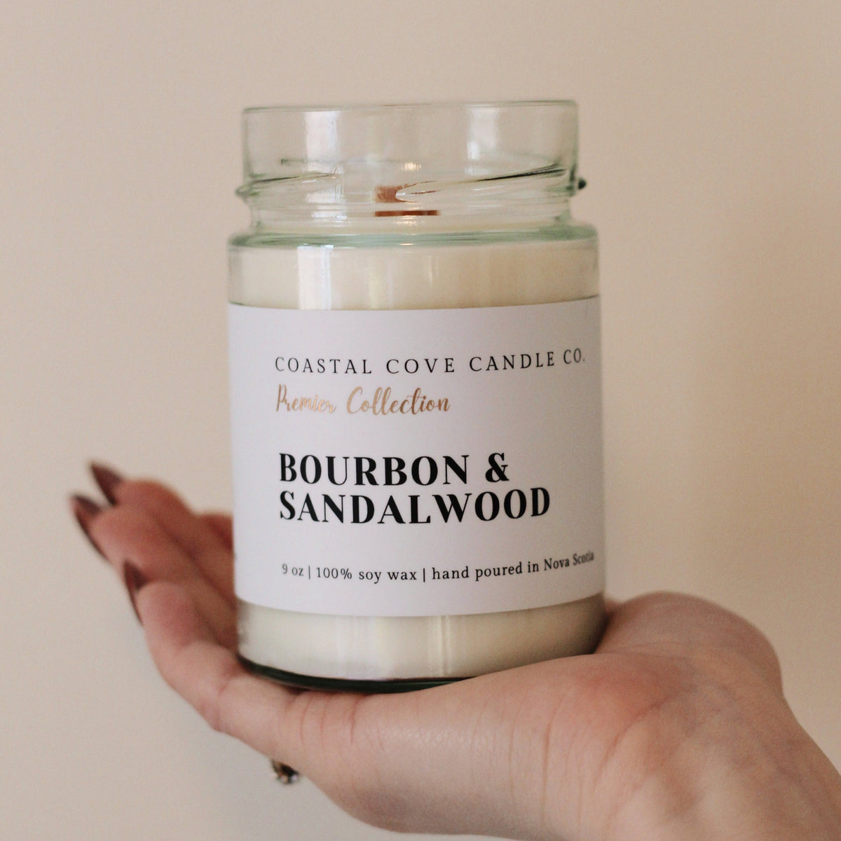 Image of a handcrafted soy wax candle with a wooden wick