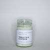 Image of a handcrafted soy wax candle with a wooden wick